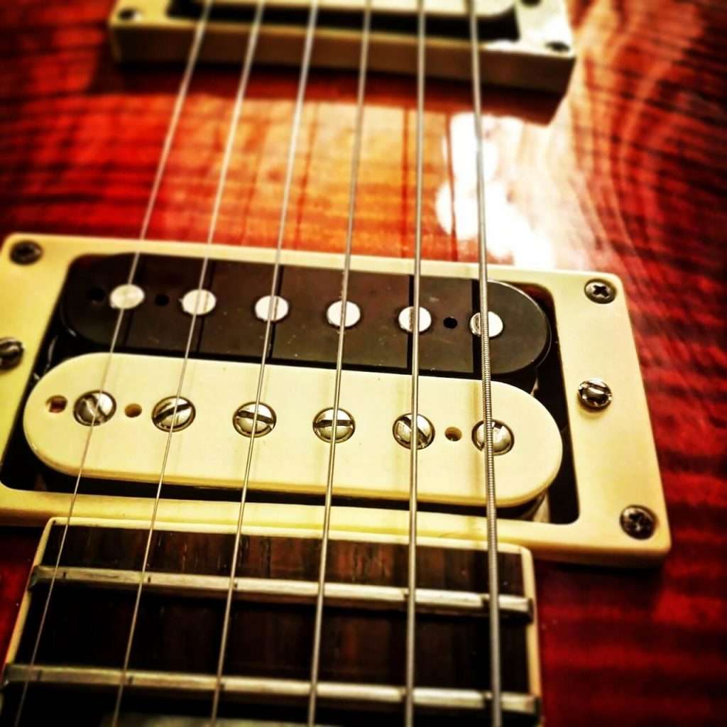 Close view of an electric guitar's pickup